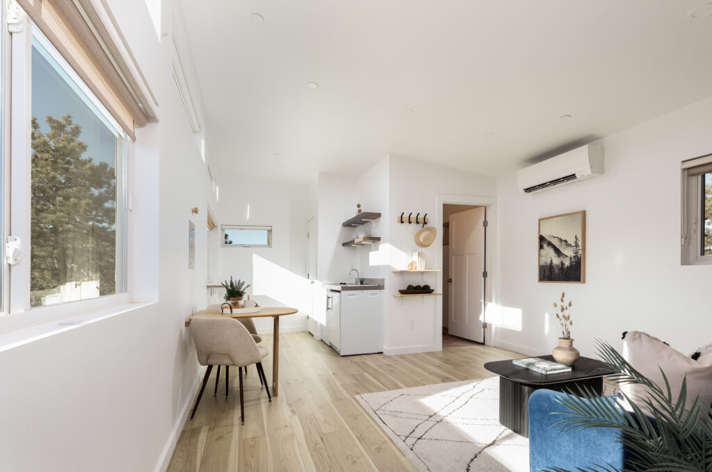 Light and modern standalone studio interior with Murphy bed on a Spring Gulch property near Lyons Colorado